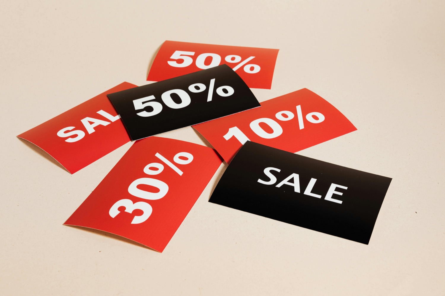 Printed offer cards on card stock, each one carrying a single offer